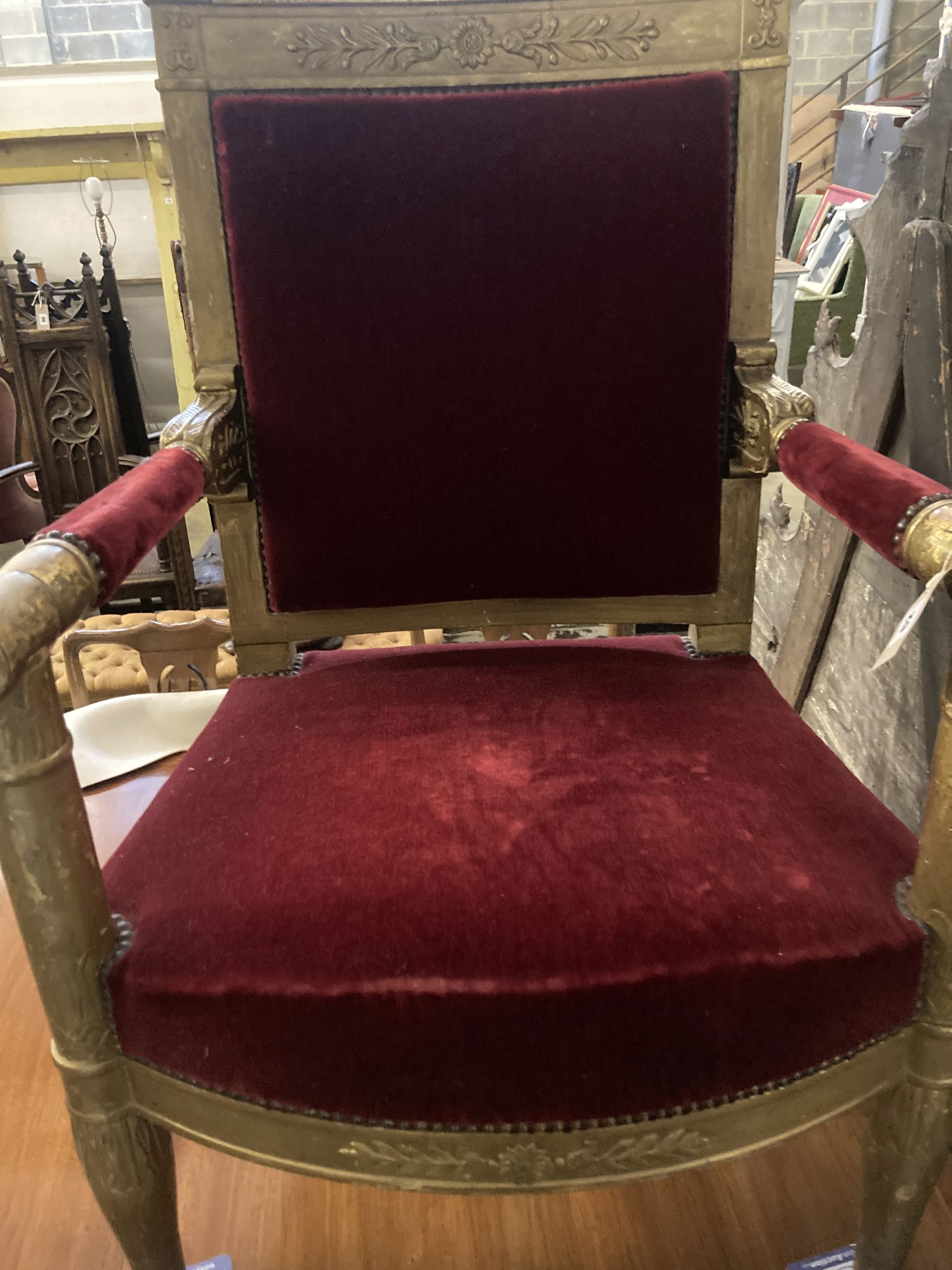 An Empire revival giltwood fauteuil, width 64cm, depth 50cm, height 98cm